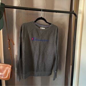 Women’s Champion sweatshirt. Normal wear, no holes.